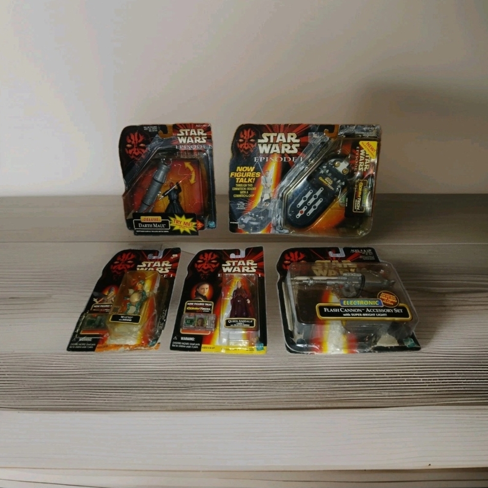 The product is a lot of 5 Kenner Star Wars Episode 1 collectibles from 1998